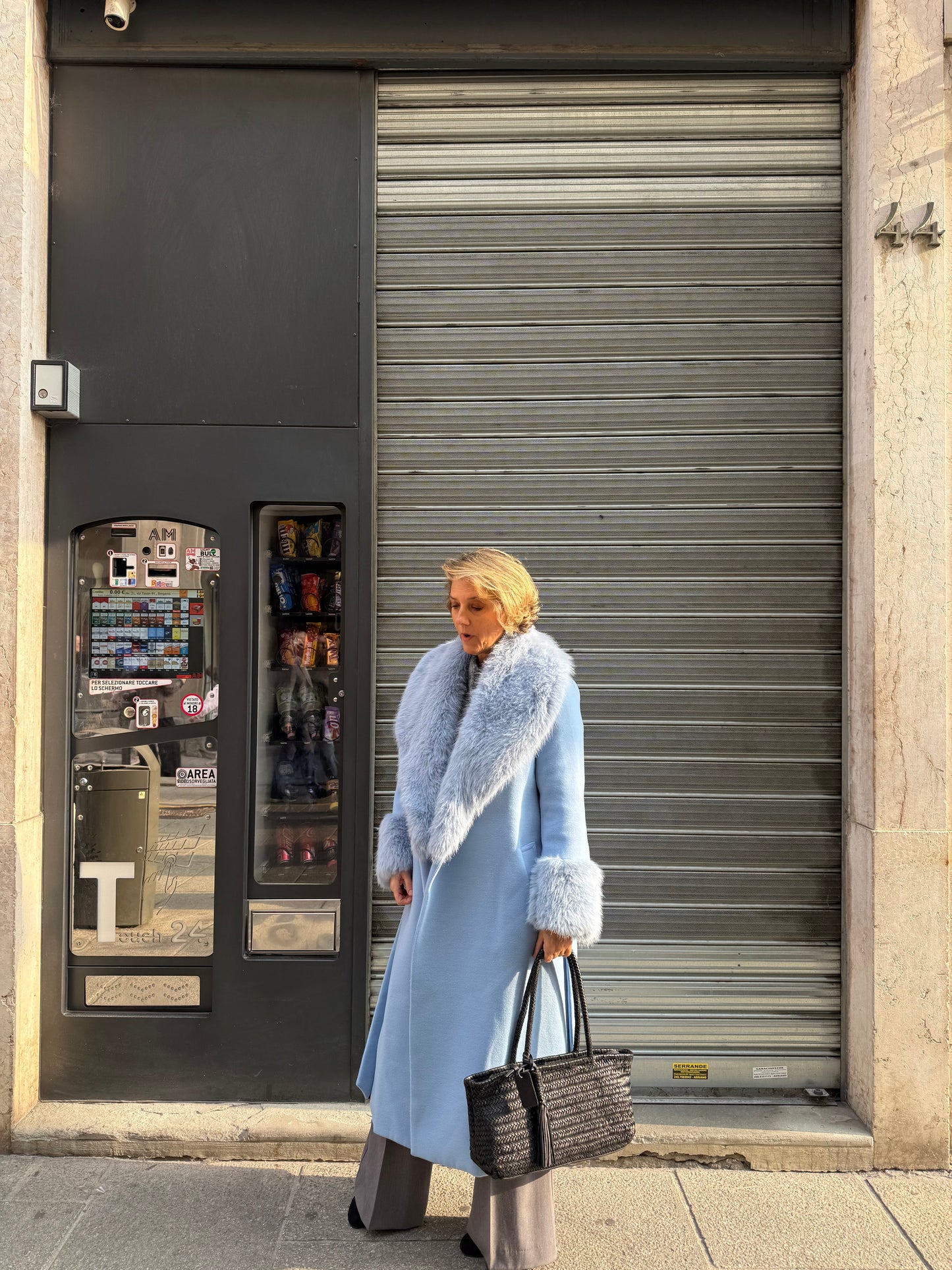 Cappotto azzurro con pelliccia